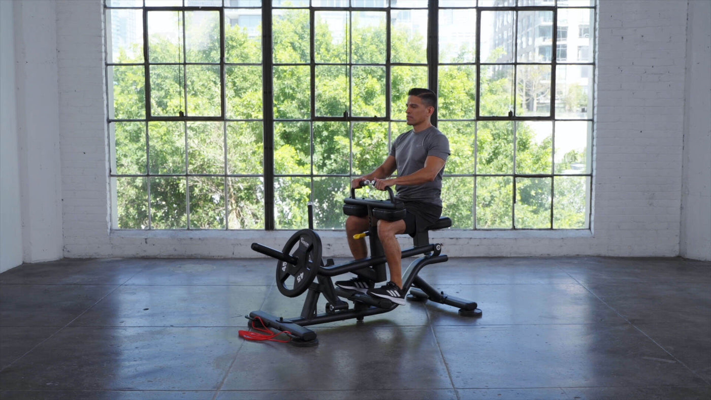 vision fitness plate loaded movements - man on calf raise machine