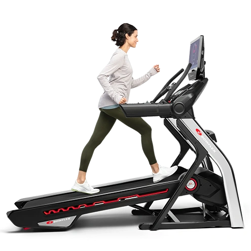 woman walking on bowflex treadmill incline feature - png
