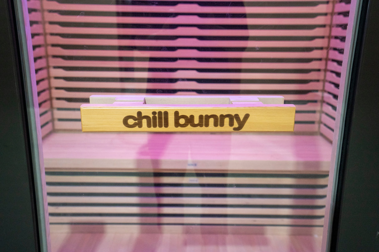 chill bunny outdoor sauna logo glass door detail - vertical