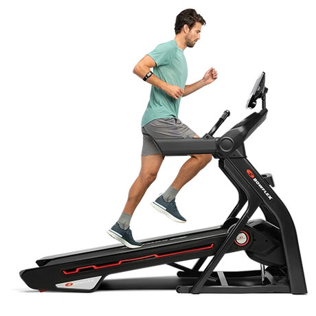 male in green tshirt running bowflex treadmill incline png 